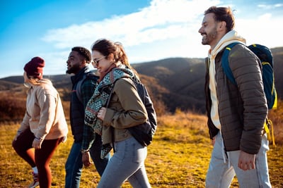 Group of men and women hiking in Autumn