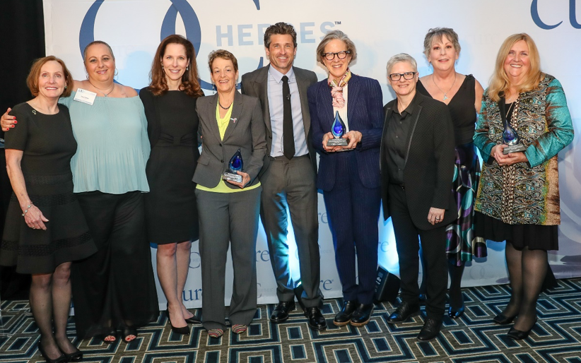 Awardees and their nominating person pose with Patrick Dempsey