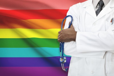 Graphic of a doctor next to an LGBTQ flag